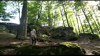 Fetish girl shows off her hot body in the woods