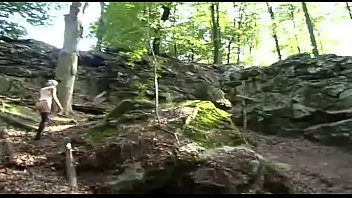 Fetish girl shows off her hot body in the woods