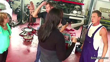 Two Young Seduce Big Tit German Milf to fuck in Workshop