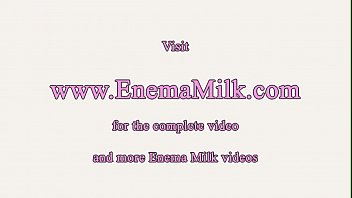 Solo enema babe squirts milk from her ass