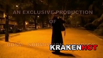 Strange BDSM video of a hot brunette showing her tits outdoor