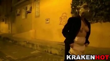 Strange BDSM video of a hot brunette showing her tits outdoor