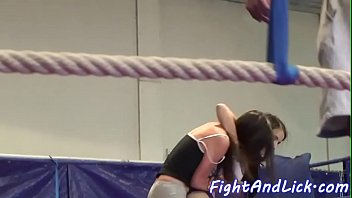 Skinny lesbians wrestling in a boxing ring