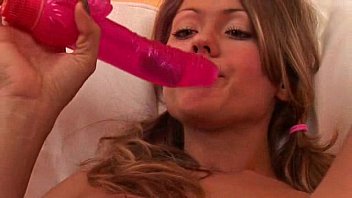 Asian model drilling her pussy with soft toy