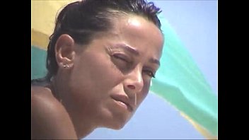 Debora Bello topless at the beach!