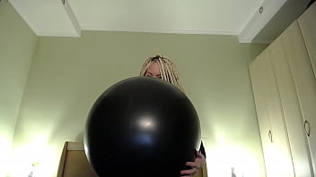 Blow big balloon and pop with long nails