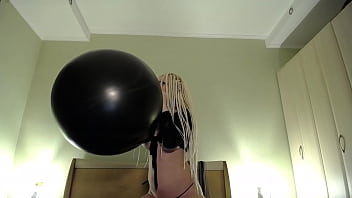 Blow big balloon and pop with long nails