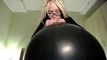 Blow big balloon and pop with long nails