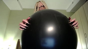 Blow big balloon and pop with long nails
