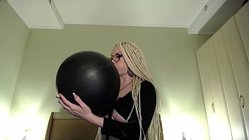 Blow big balloon and pop with long nails