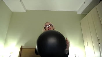 Blow big balloon and pop with long nails