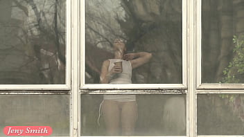Jeny Smith teasing the strangers thru the window