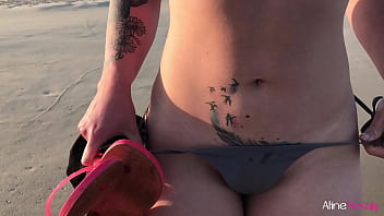 Blonde girl on the beach having sex with her fan