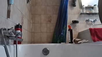 Italian stepmom wets her pantyhose in the shower to turn you on