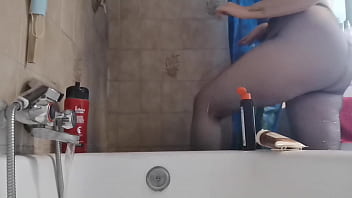 Italian stepmom wets her pantyhose in the shower to turn you on