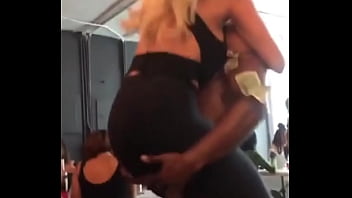 Lindsey Pelas with a fan