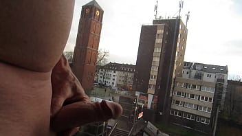 Cumshot in hotel window Cologne, many people around - exhibitionist