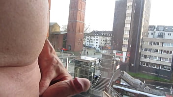 Cumshot in hotel window Cologne, many people around - exhibitionist