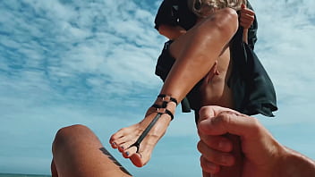 A Blonde Girl strokes a Guys Dick with Feet, Masturbates, he Cums, Public Nudist Beach, Foot fetish