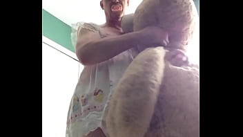 ABDL diapered sissy in pretty pink dress with teddybear