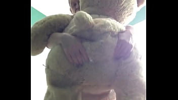 ABDL diapered sissy in pretty pink dress with teddybear