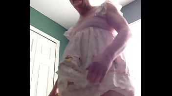 ABDL diapered sissy in pretty pink dress with teddybear