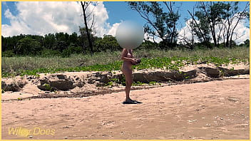 Wife plays football nude at public clothed beach
