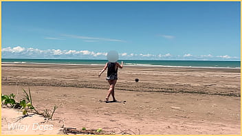 Wife plays football nude at public clothed beach