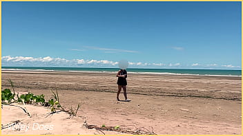 Wife plays football nude at public clothed beach