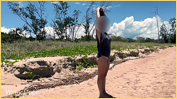 Wife plays football nude at public clothed beach