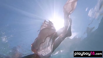 Big boobed naked Russian babe Katya Clover teasing under the water outdoor