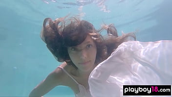 Big boobed naked Russian babe Katya Clover teasing under the water outdoor