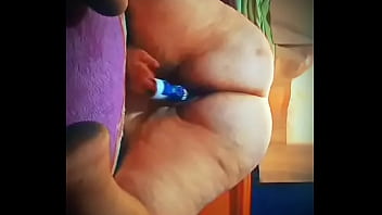 Mature lady masturbating with deodorant on all four