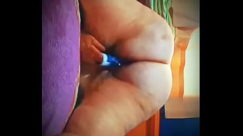 Mature lady masturbating with deodorant on all four