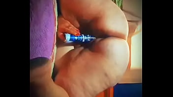 Mature lady masturbating with deodorant on all four