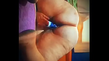 Mature lady masturbating with deodorant on all four