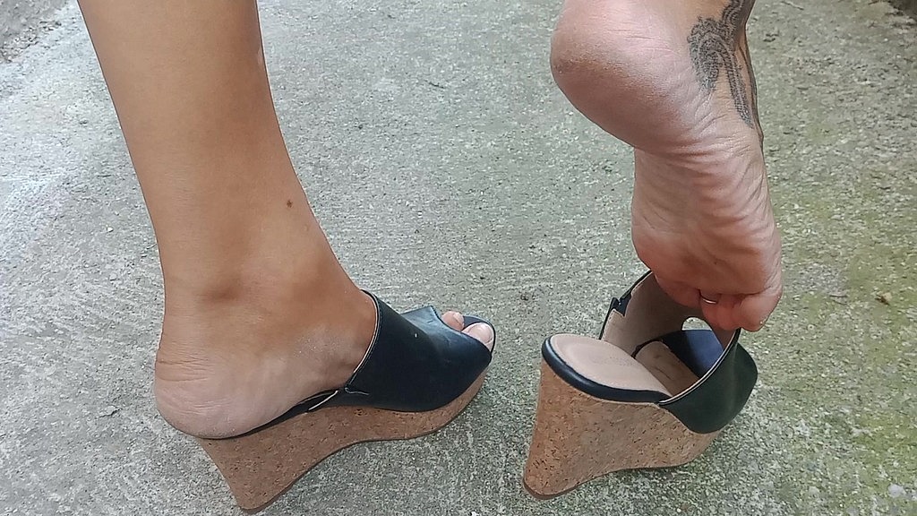 me walking outside in my heeled wedges.