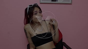 Sensual Latin girls with huge tits and radiant tattoos kiss and suck each other'_s tits