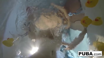 Sexy Nadia takes a bath with some rubber duckies