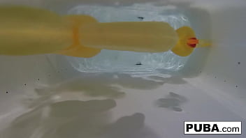 Sexy Nadia takes a bath with some rubber duckies