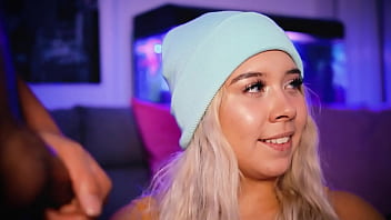 Blonde with a cute face gives her boyfriend a footjob