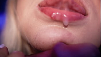 Blonde with an angelic face sucks a cock close to the camera