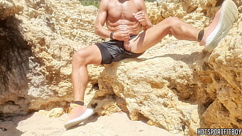 Sexy guy masturbating his big cock in a public beach - Almost Caught