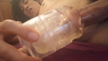 Horny Jon Arteen tries not to cum too fast while slow fucking a lubed Fleshlight in blancket, eye rolling