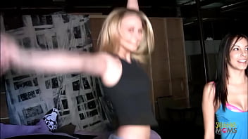 Two girls taking turns sucking a dick and fucking on the sofa