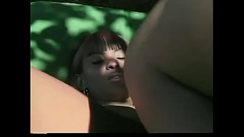 Two black sluts with red hair finger and tongue fuck pussies on a sun lounger by the pool