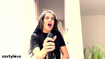 Hot Teen does JOI Dirty Talk while sucking on a Big Black Dildo