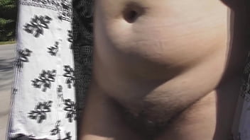 Hairy mature flashing on highway