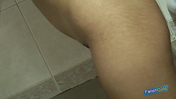 Young Japanese brunette enjoys having a hot shower with a white tattooed guy