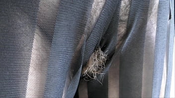 Hairy mature in transparent dress flashing in the park